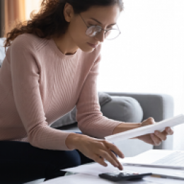 Woman using a calculator