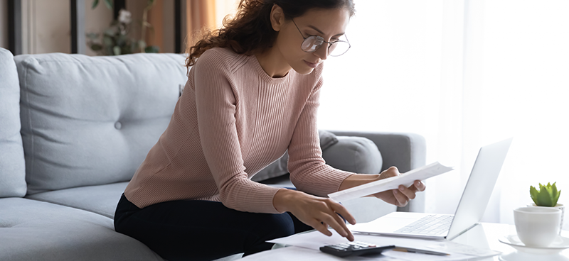 Woman using a calculator
